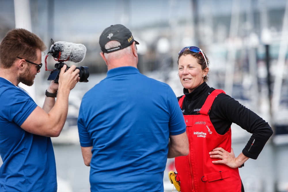 Brit and skipper of Initiatives Coeur alongside Paul Meilhat, Sam Davies fields questions on the dock at the finish of the Rolex Fastnet Race © Paul Wyeth/www.pwpictures.com