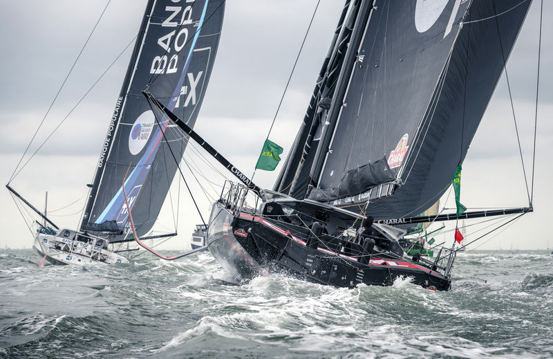 Jeremie Beyou's Charal chasing down Banque Populaire at the start of the Rolex Fastnet Race © Kurt Arrigo/Rolex