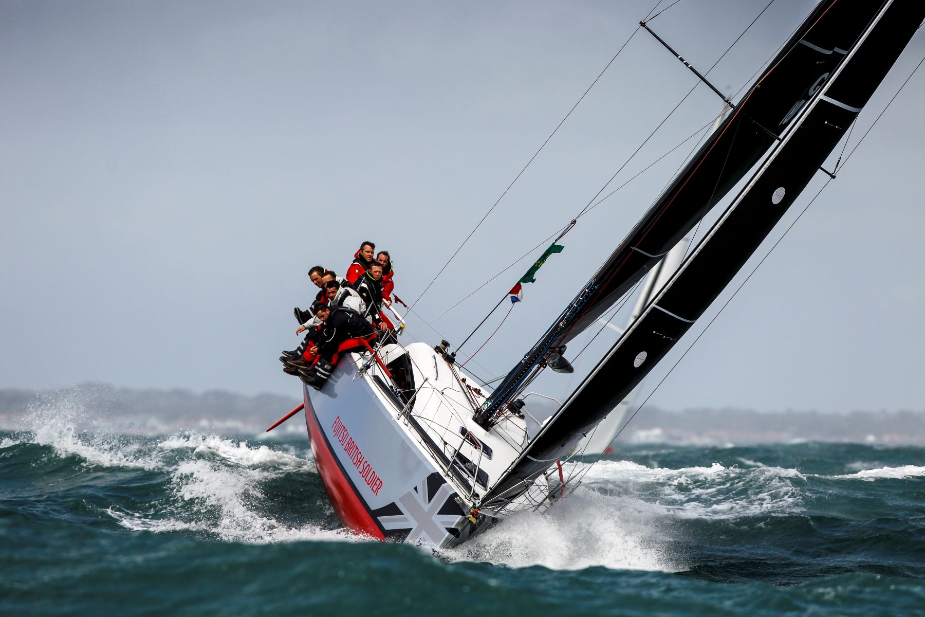 Winning the Culdrose Trophy for being first IRC [armed] service yacht round the Rock on corrected time is Sun Fast 3600 Fujitsu British Soldier, skippered by Major Henry Foster © Paul Wyeth/pwpictures.com