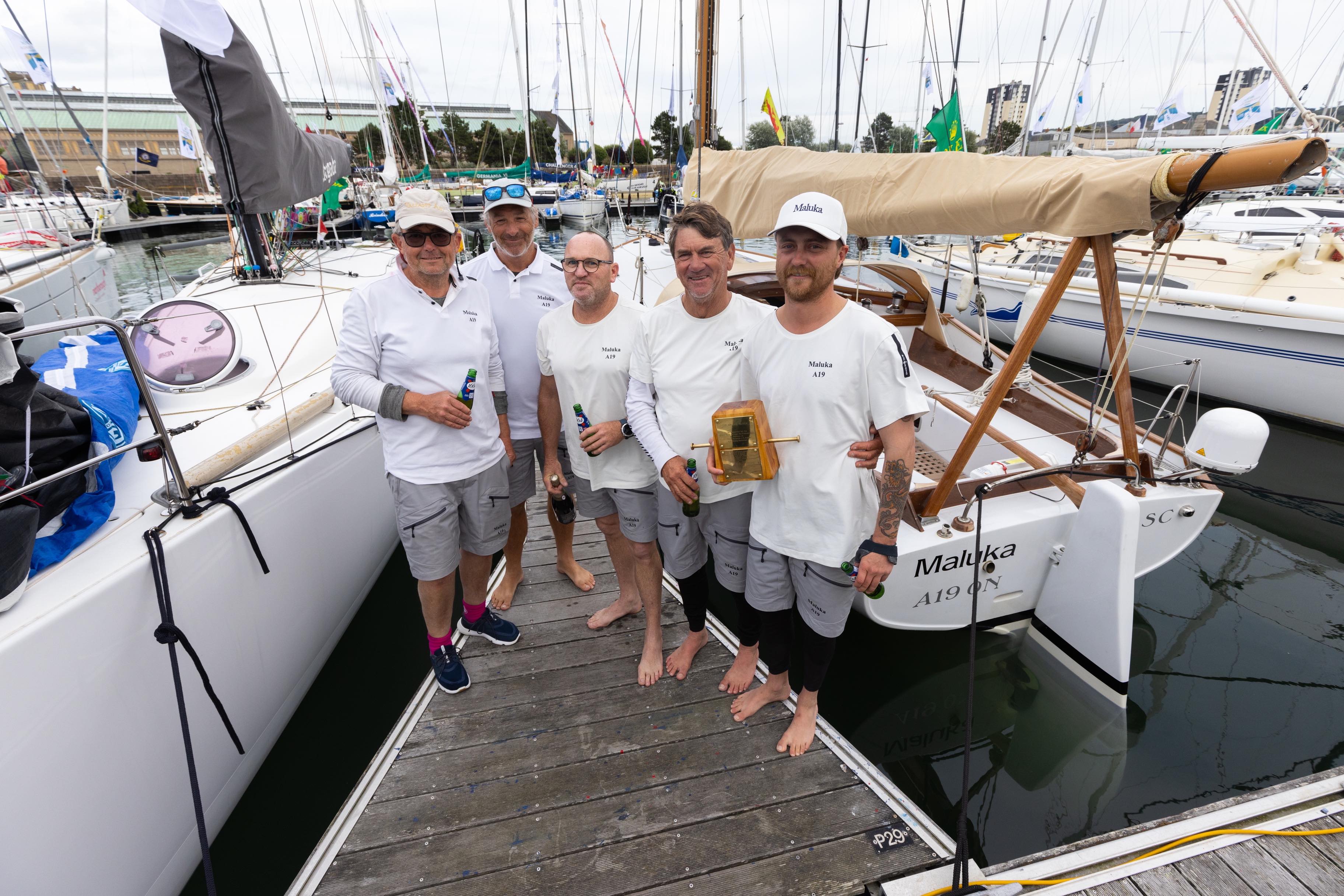 Maluka's crew may have missed the prize-giving but they were awarded their prize, the Iolaire Block for the oldest boat to complete the course, on the dock © Arthur Daniel/RORC