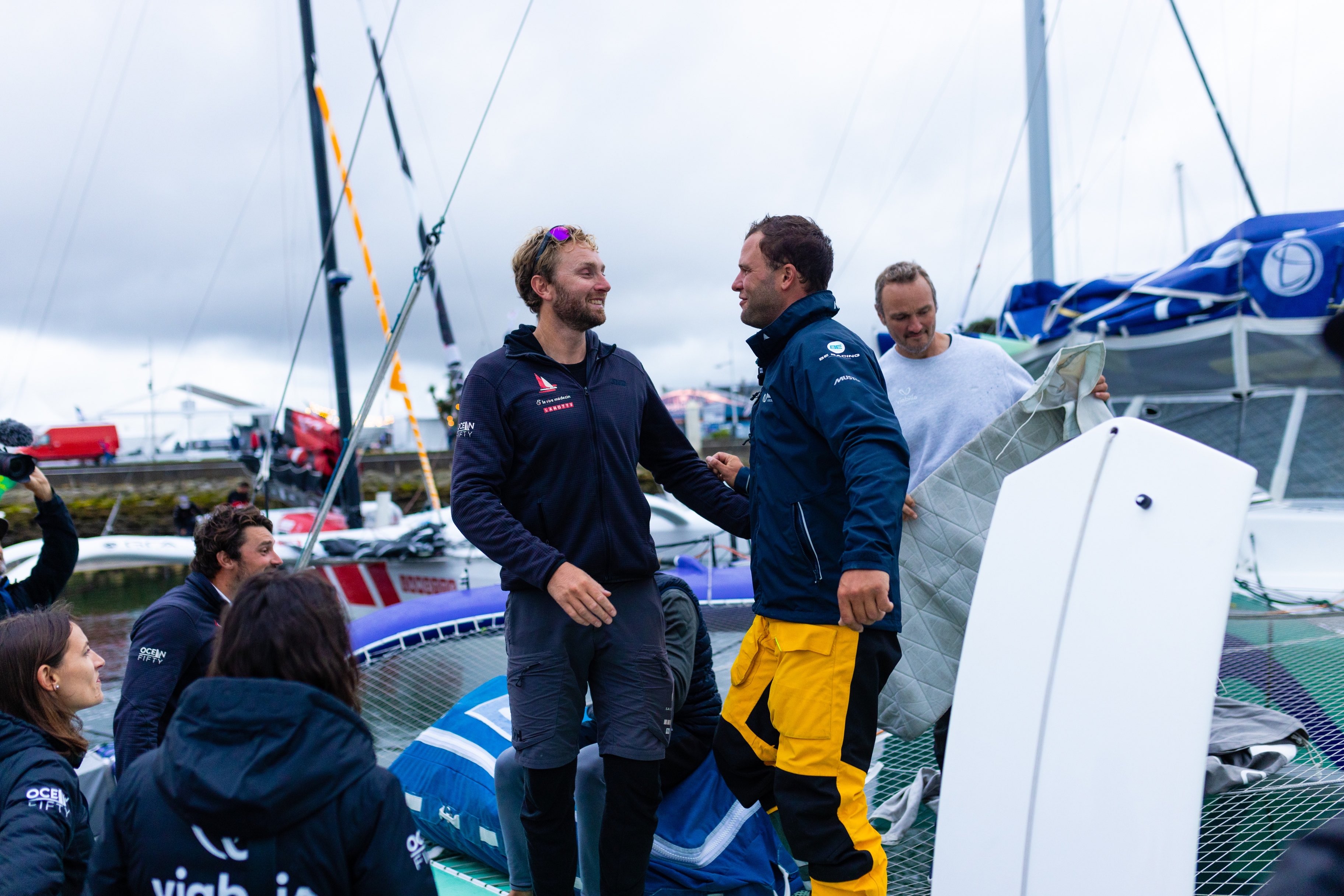 After an intense two-day match race at sea, Luke Berry and Pierre Quiroga congratulate each other on the race © RORC/Arthur Daniel