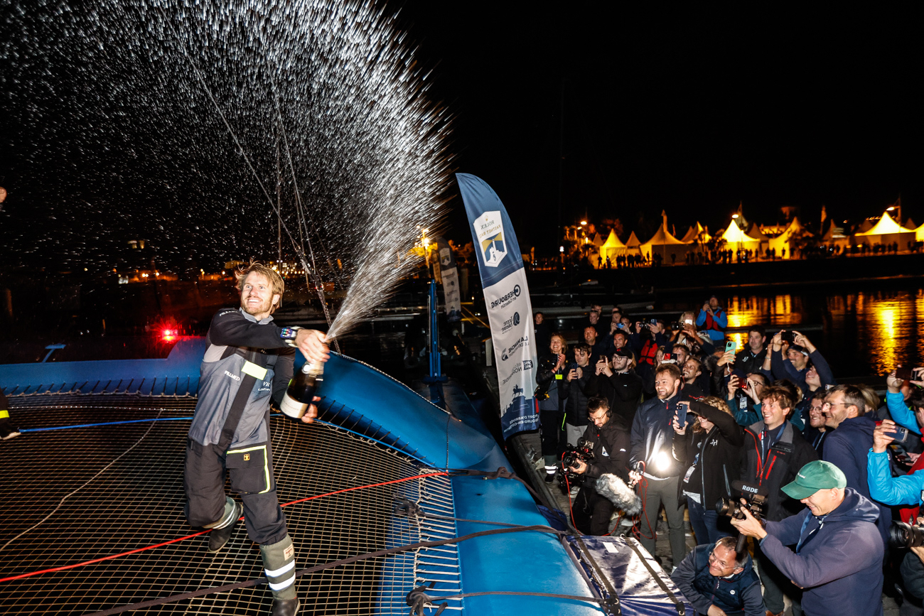 François Gabart celebrates his Ultim class victory © Paul Wyeth/www.pwpictures.com