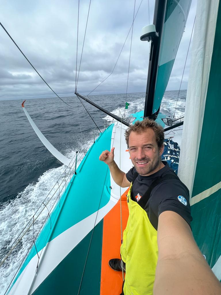 Sam Goodchild finds time for a selfie on board his IMOCA For the Planet