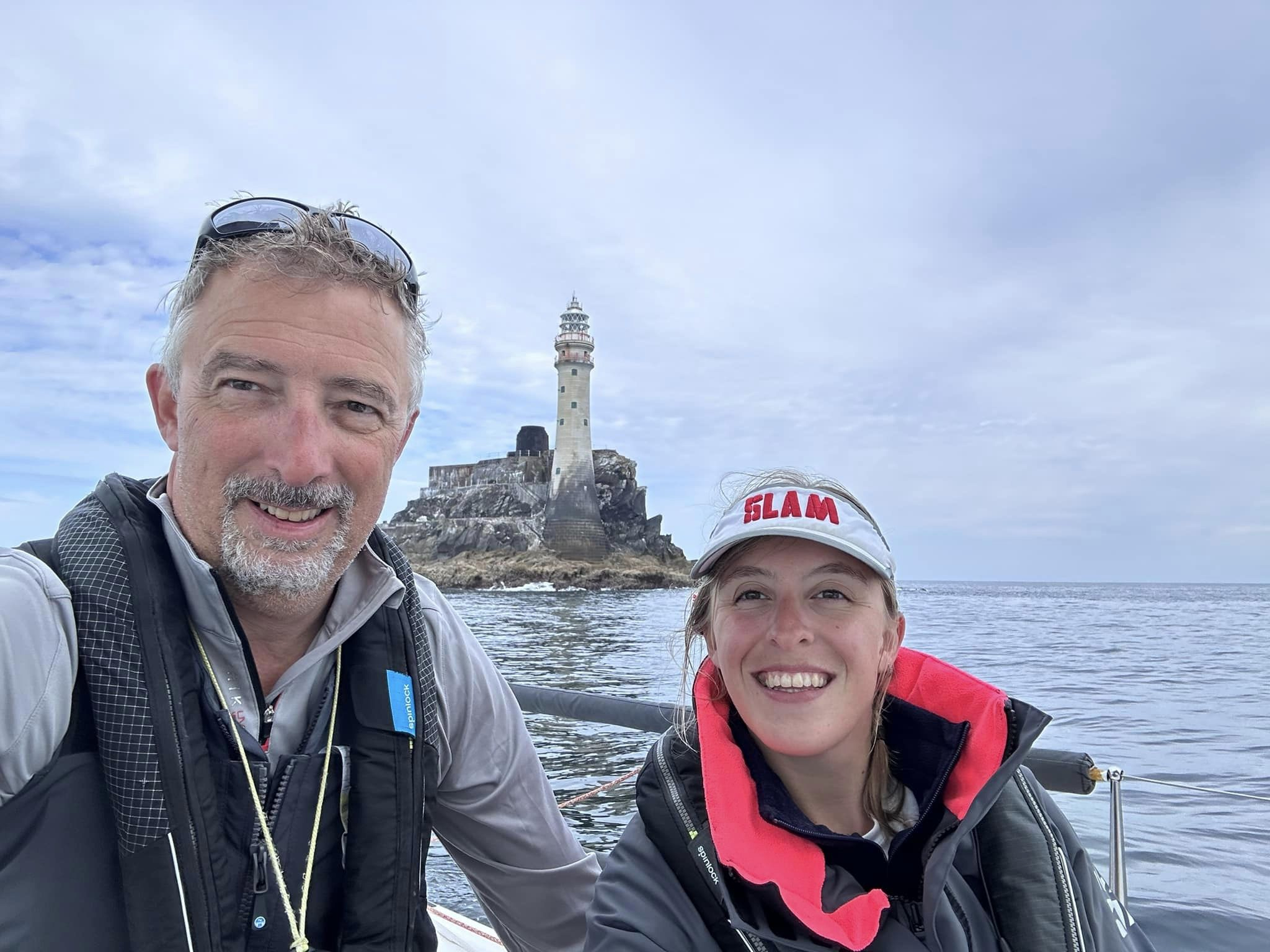 Onboard JPK 1010 Jangada with father and daughter doublehanded team Richard and Sophie Palmer as they round the Fastnet Rock