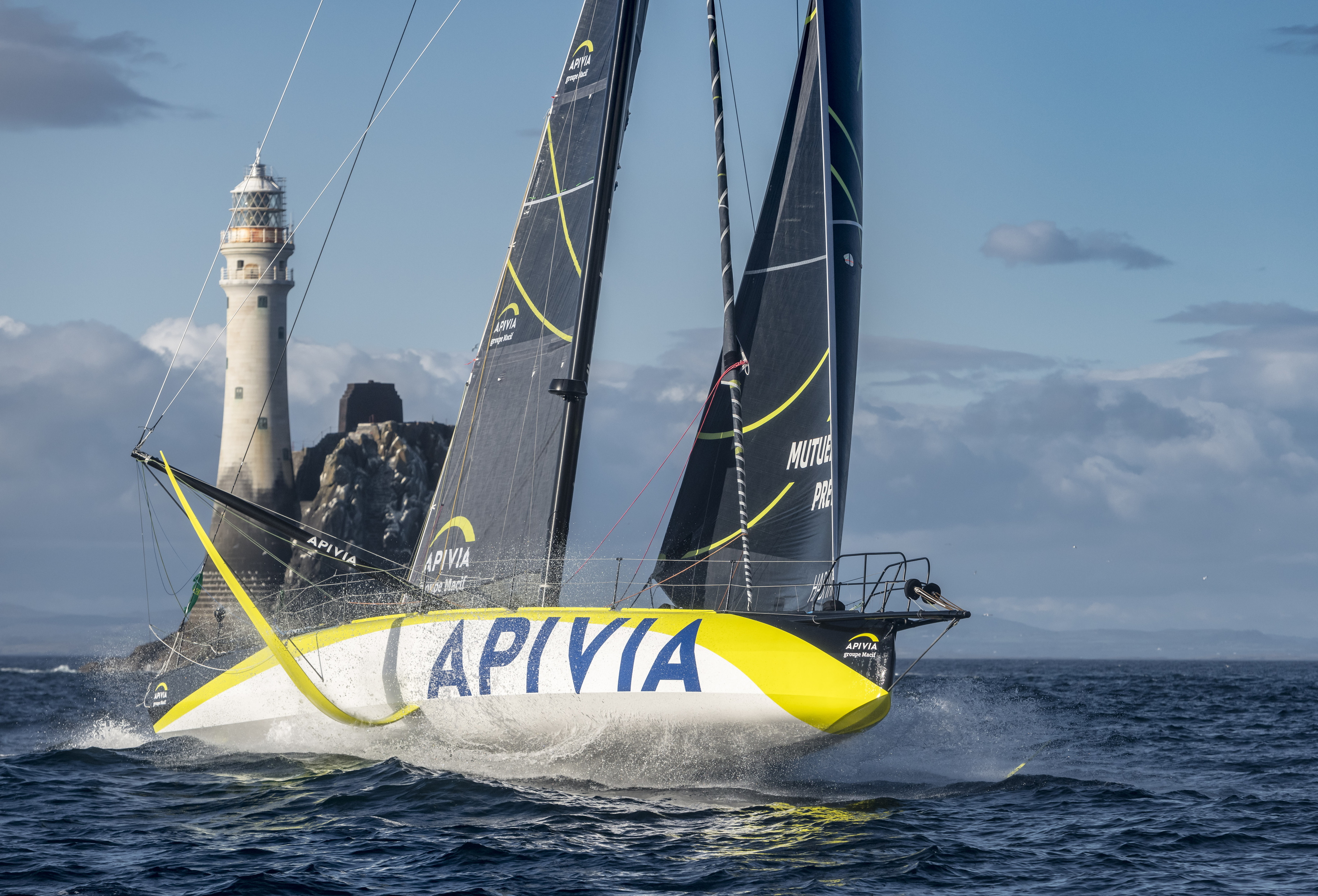 The IMOCA 60 Apivia at the emblematic Fastnet Rock in the 2021 Rolex Fastnet Race © Kurt Arrigo/Rolex 