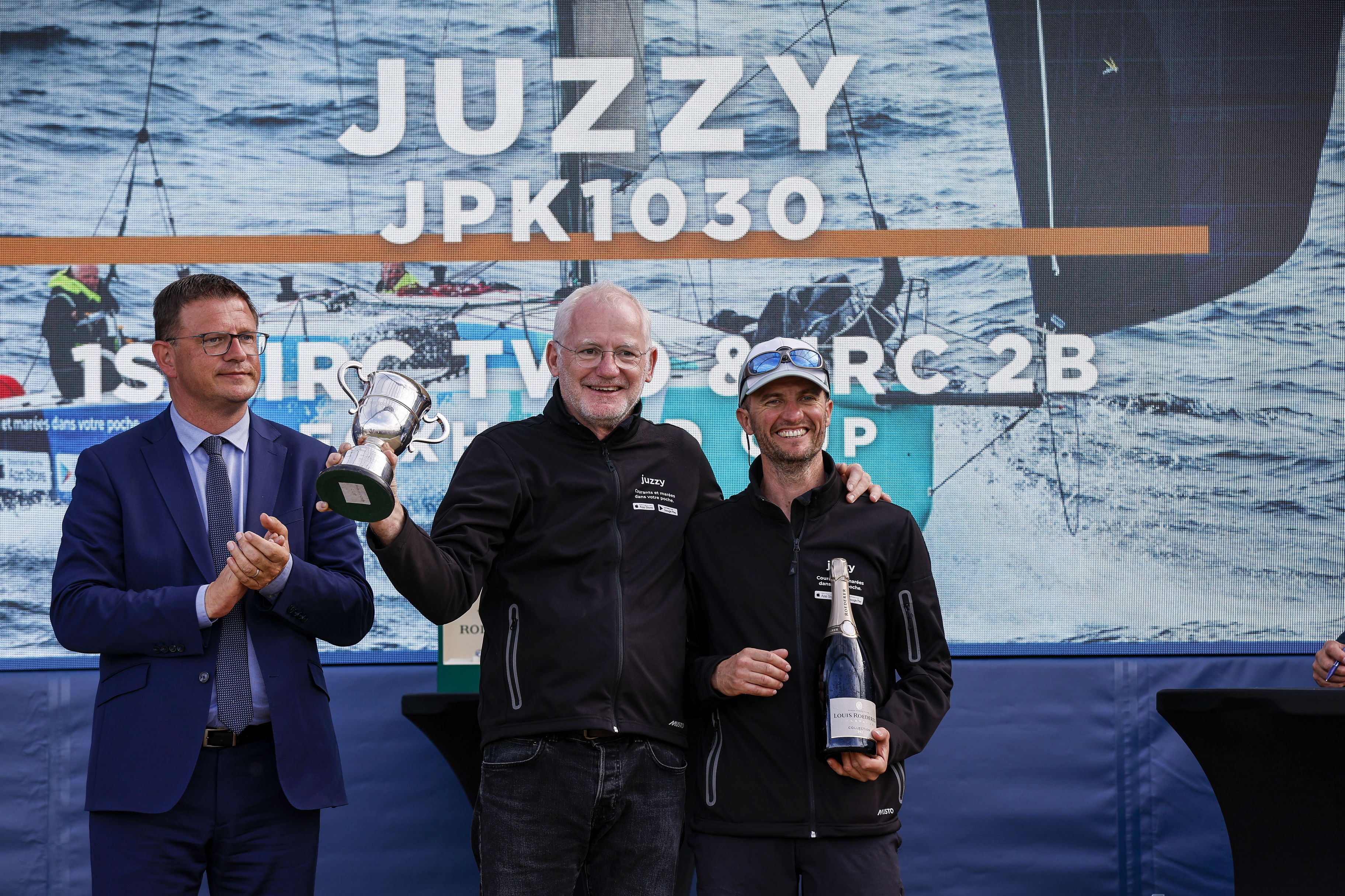 Mairie de Cherbourg-en-Cotentin Benoît Arrivé presents the winners of IRC Two -Thomas Bonnier and David Prono - JPK 1030 Juzzy - with the Foxhound Cup for their class win © Paul Wyeth/pwpictures.com