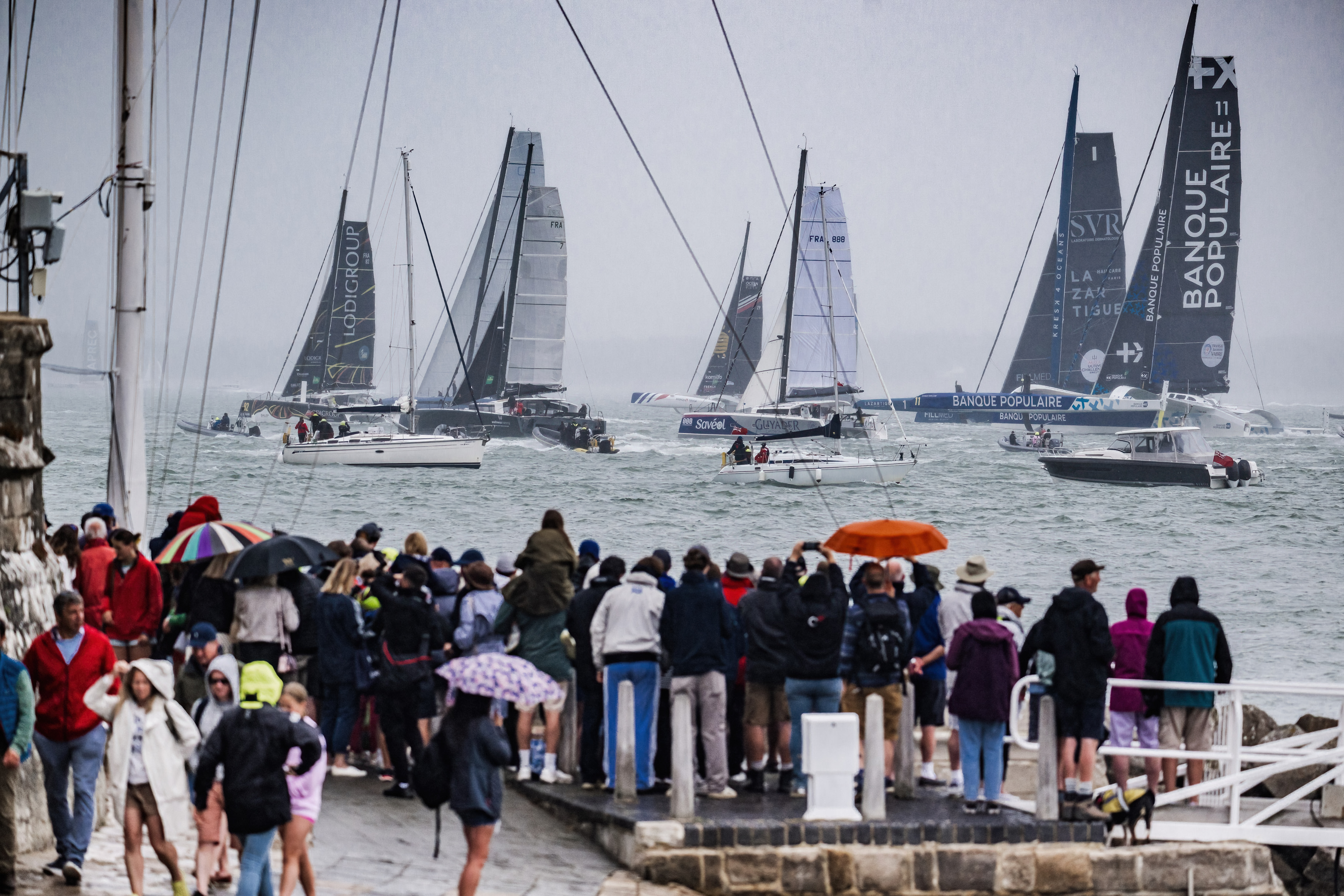 Thousands of spectators braved the inclement conditions to watch the start of the world's largest offshore race  © Martin Allen/pwpictures.com